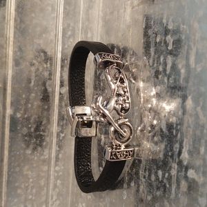 Stainless steel motorcycle charm leather bracelet.  NWOT